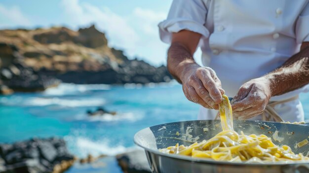 The chef wearing a white apron preparing pasta at sea view