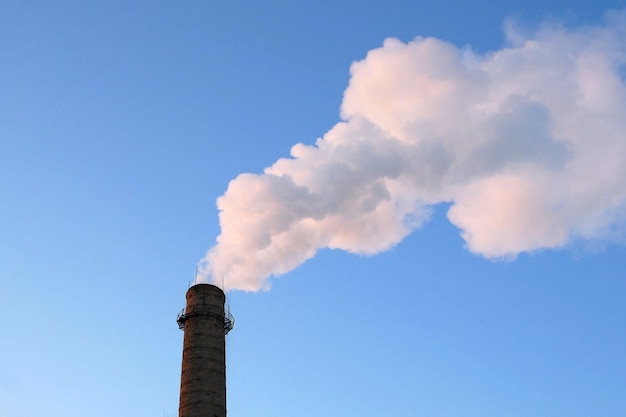 chemical plant towers of nuclear power plant against the blue sky