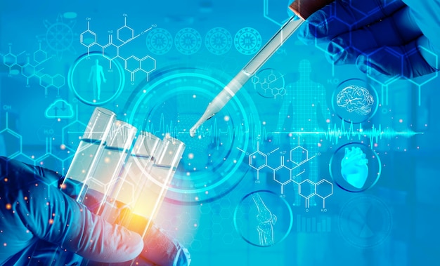 Chemist holding a test tube in light blueLaboratory glassware with a dropper dripping liquid into a test tube scientific laboratory test tubes equipment