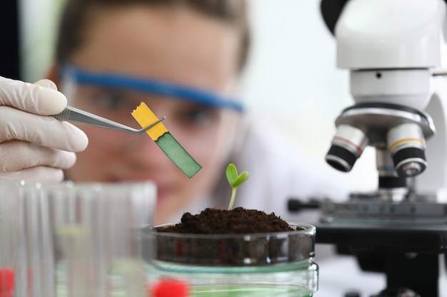 Chemist in protective glasses