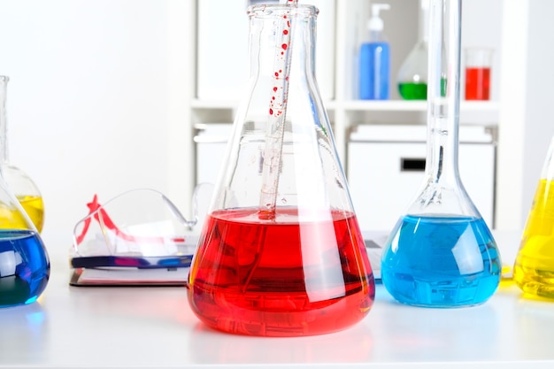 Chemist's desk in the laboratory. Scientist workplace in laboratory