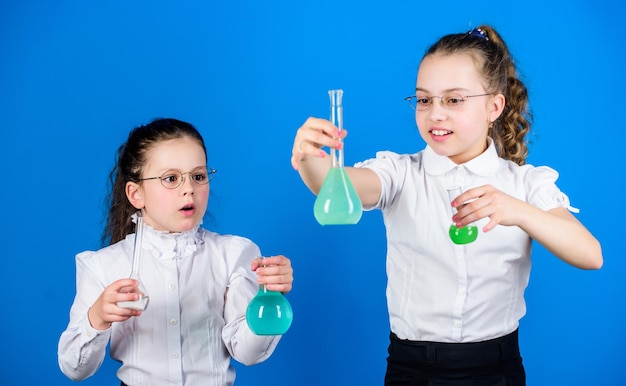 Chemistry fun Basic knowledge Knowledge day Schoolgirl with chemical liquids Education concept Safety measures Knowledge and information Experimenting a bit Small kid study Education concept