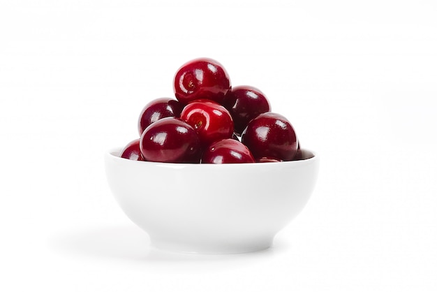 Cherries in cup isolated