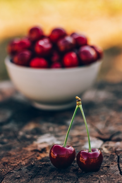 Cherries on a white bowl