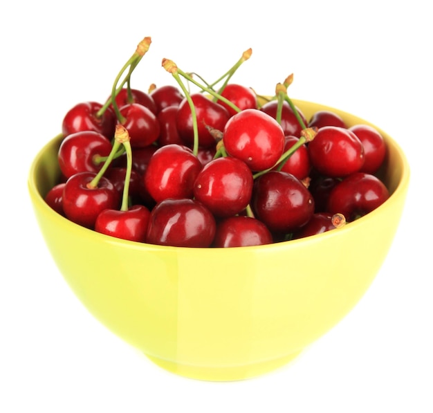 Cherry berries in bowl isolated on white