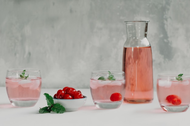 Cherry cocktail with mint leaves