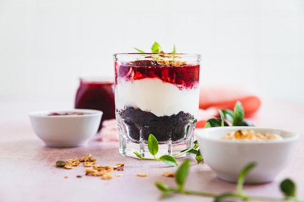 Cherry cream cheese and chocolate biscuit portion layered dessert Black forest trifle Summer dessert