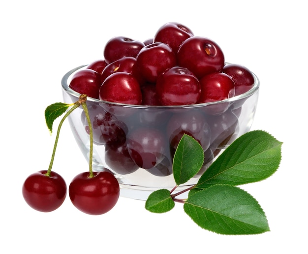 Cherry in a glass on a white background