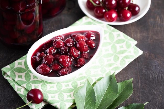 Cherry jam and fresh cherries in a bowl homemade preserves