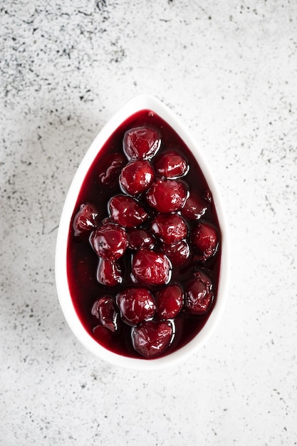 Cherry jam and fresh cherries in a bowl homemade preserves