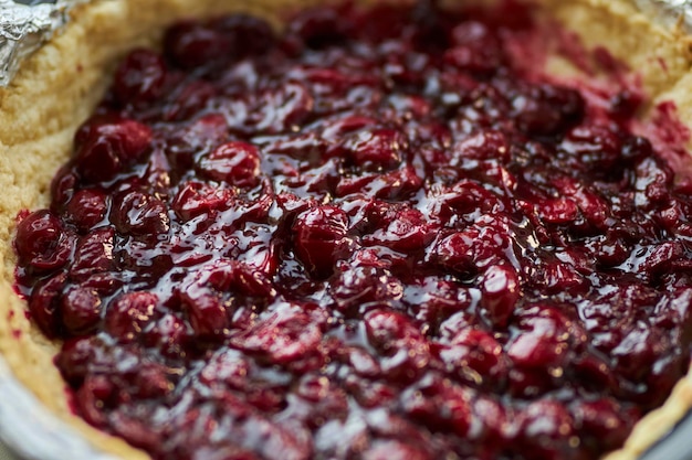 Cherry pie close up. The process of making cherry pie. Homemade pie recipe. cooking