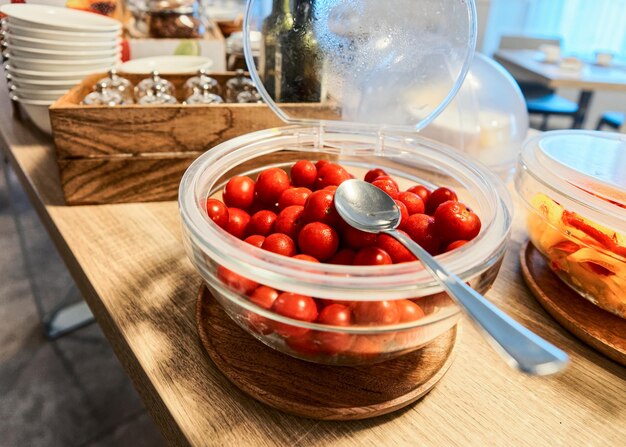 Cherry tomato bowl. Top view. Organic nutrition. Rustic food. Macro closeup. Diet menu. Vegan homemade cooking. Gourmet Healthy eating. Wooden table Background. Vegetarian set. Fresh ripe. Tasty meal.