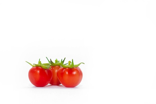 Cherry tomatoes isolated on a white