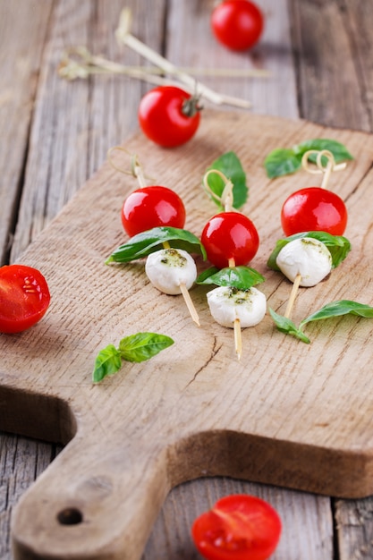 Cherry tomatoes,mozzarella and Basil on skewers