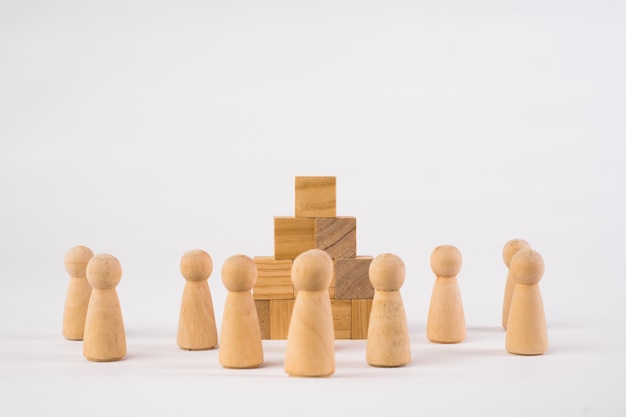 Chess figures and toy wooden ladder,concept to symbolize achievement, growth and success.