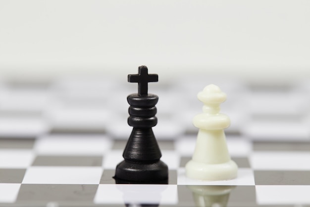 Chess pieces on a chessboard close up