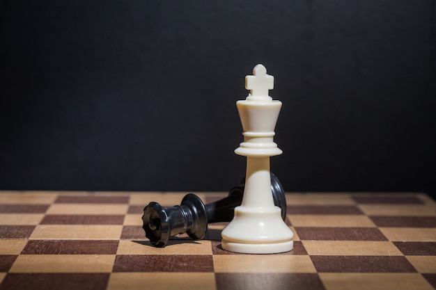 Chess pieces set on a chessboard