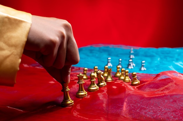 Chess on Red Blue Fabric as abstract of USA China Taiwan Crisis Map Military move force sanction to stop trade chip technology on Taiwan Invasion Threat is game tension international copy space