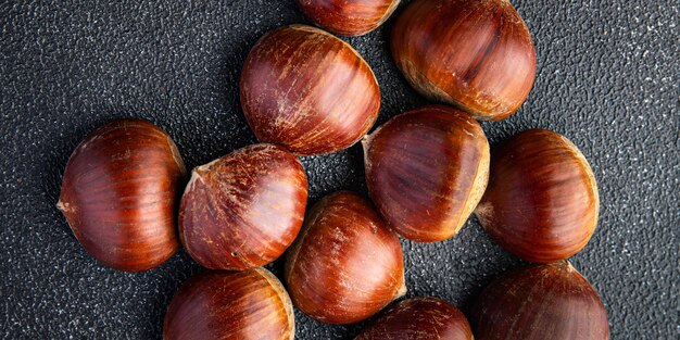 chestnuts edible snack meal food on the table copy space food background rustic top view