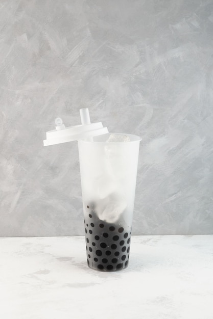 Chewy Tapioca balls Boba or Pearls in plastic take away cup Taiwanese Boba drink or Bubble milk tea