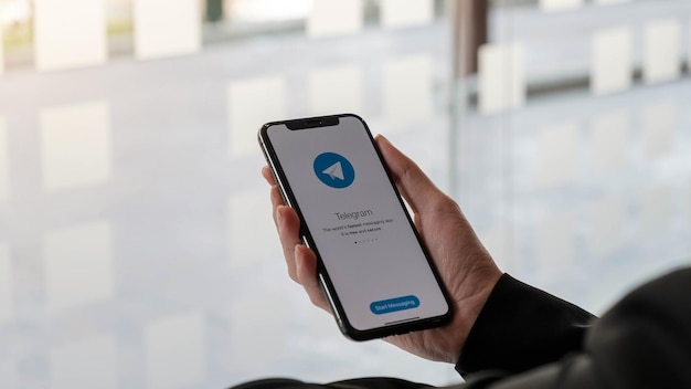 CHIANG MAI THAILAND JAN 17 2021 Telegram application icon on Apple iPhone Xs screen closeup Telegram app icon Telegram is an online social media network Social media app