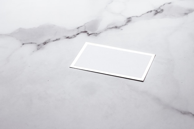 Chic business card or invitation mockup on marble background paper and stationery branding