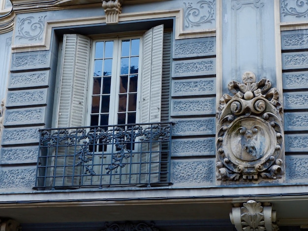 Chic vintage balcony with elegant details in centre of Madrid Spain Chueca district