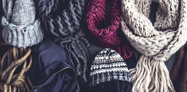 Photo chic winter accessories including scarves hats and gloves highlighting the stylish coldweather wear