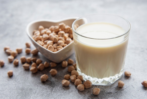 Chick peas milk with chick peas on the table