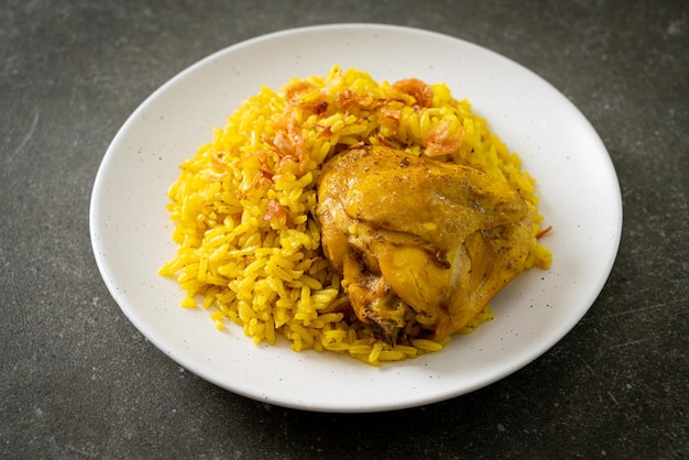 Chicken Biryani or Curried rice and chicken ThaiMuslim version of Indian biryani with fragrant yellow rice and chicken