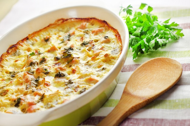 Chicken breast and cauliflower casserole in ceramic baking dish