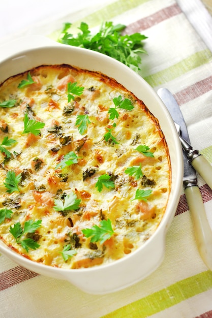 Chicken breast and cauliflower casserole in ceramic baking dish