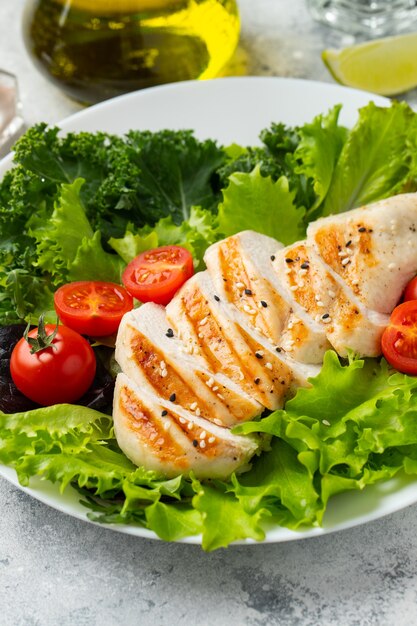 Chicken breast fillet and vegetable salad.