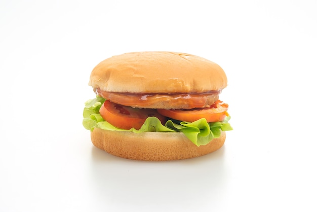 chicken burger with sauce isolated on white surface