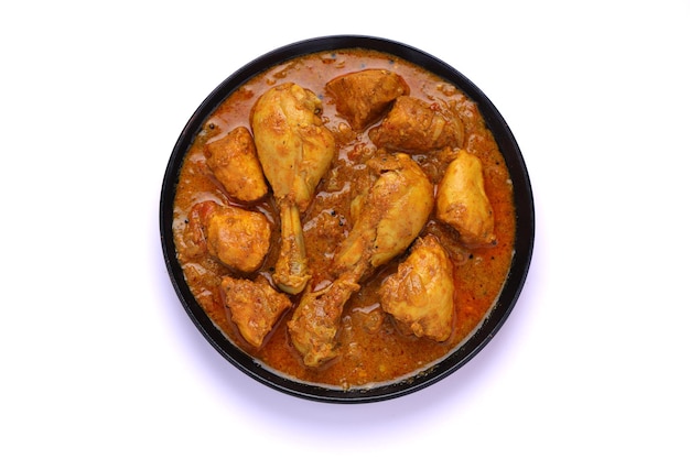 Chicken curry or masala Kerala style chicken curry using fried coconut in traditional way