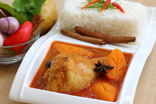 Chicken curry with rice and chopsticks