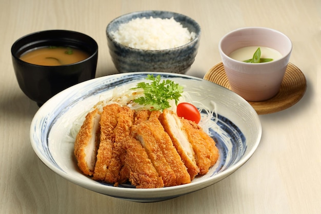 Chicken Cutlet Set with Miso Soup and Chawanmushi served in a dish isolated on wooden table background side view of singapore food