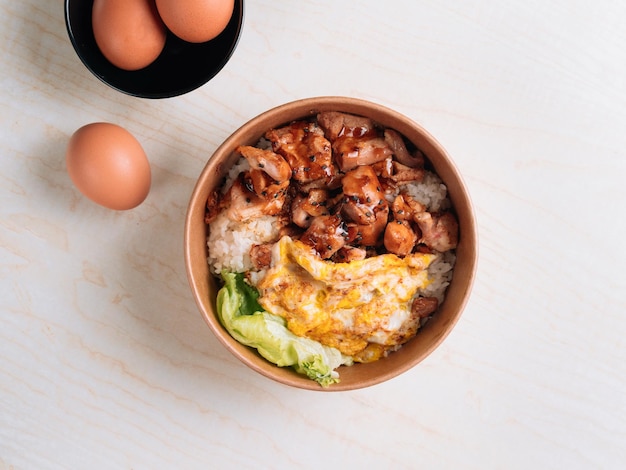 Chicken Don with rice egg served in japanese style food set top view on grey background