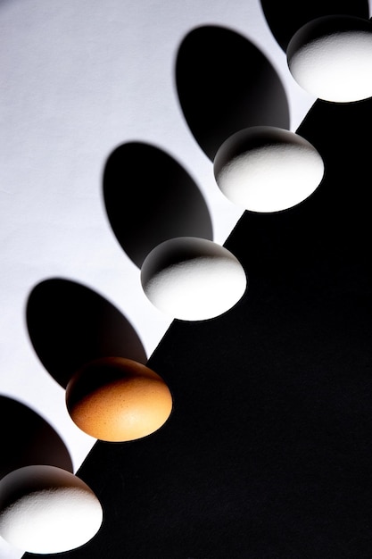 Chicken eggs on a black and white background