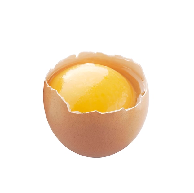 Chicken eggs in broken eggshells isolated on white background