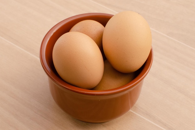 Chicken eggs in a brown bowlEggs are a rich source of selenium an antioxidant important for thyroid