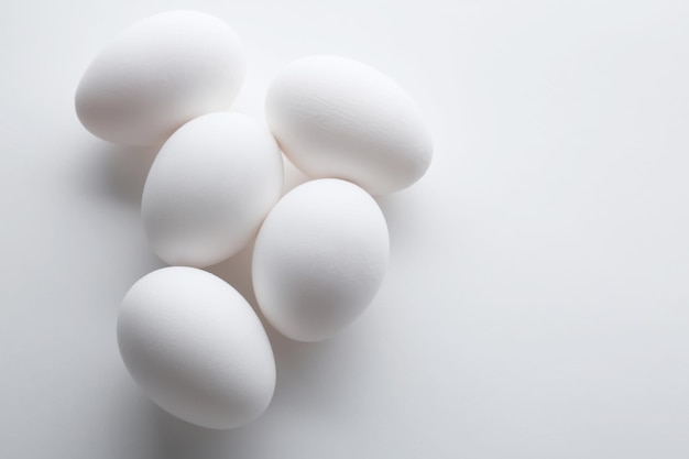 Chicken eggs on white background