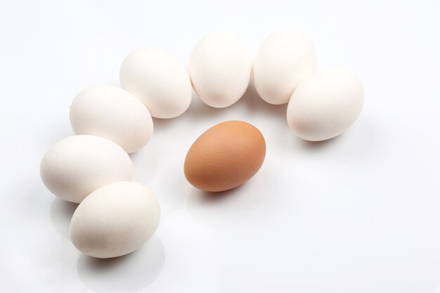 Chicken eggs on white