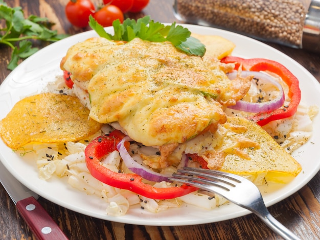 Chicken fillet baked with cheese and vegetables