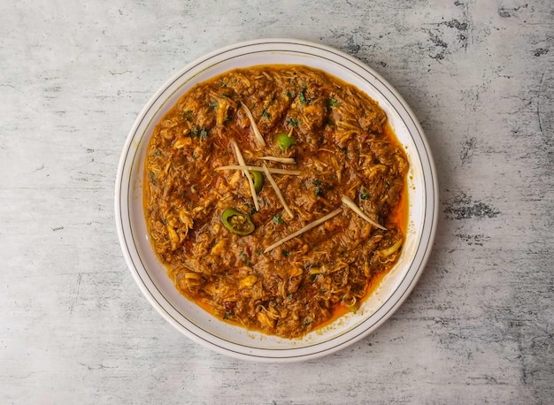 Chicken lacha or chicken keema served in a plate isolated on background top view of indian and pakistani desi food