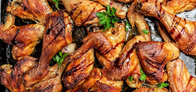 Chicken legs, wings grilled, fried on oven on baking tray