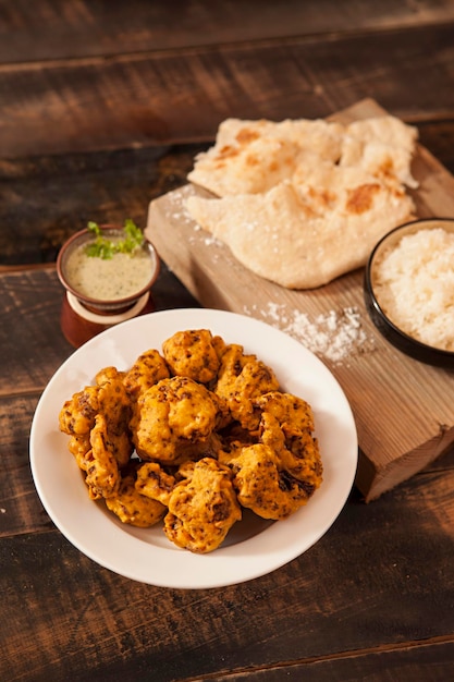 Chicken Pakora, Indian food, Bowls and plates with indian food top view, spice