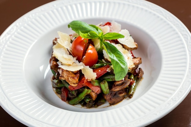 Chicken salad with vegetables and parmesane