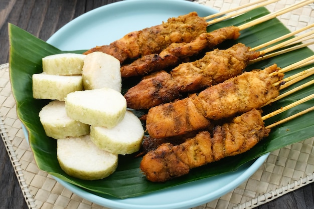 Chicken satay sate ayam sate martawi with Lontong and peanut sauce Selected focus