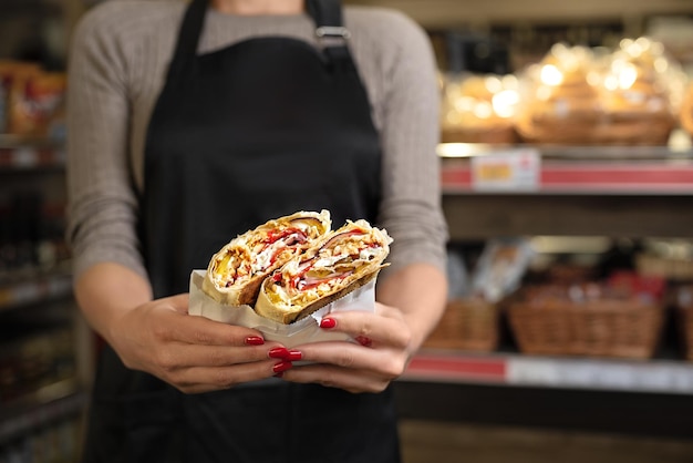 Chicken shawarma doner kebab burrito filling for fries and chicken with pita bread dish on a tray healthy snack